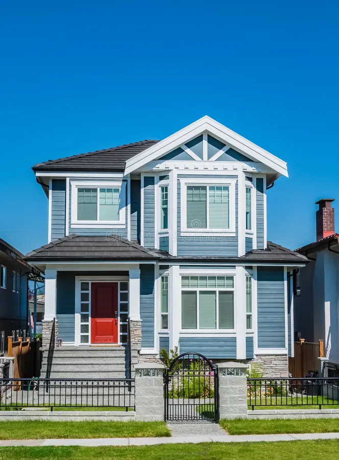 Modern two-story home showcasing professional Window replacement, a trusted window replacement company, quality window installation services, options for homeowners searching for a window replacement contractor near me, and an experienced window contractor.