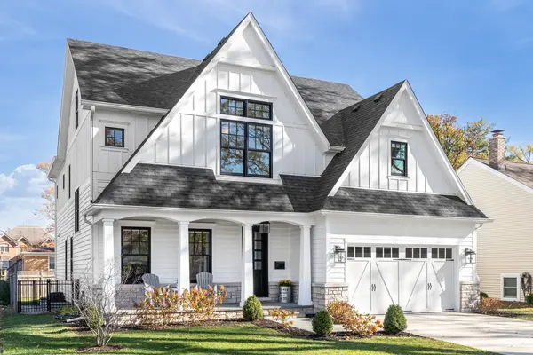 Modern white home featuring Residential window installers, residential windo installation, vinyl window installers, and energy efficient window installation services for professionally installed replacement windows.